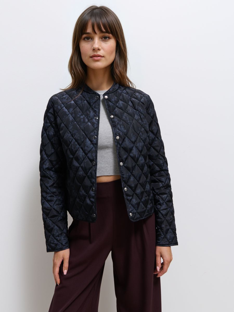 Pikowana srebrna kurtka