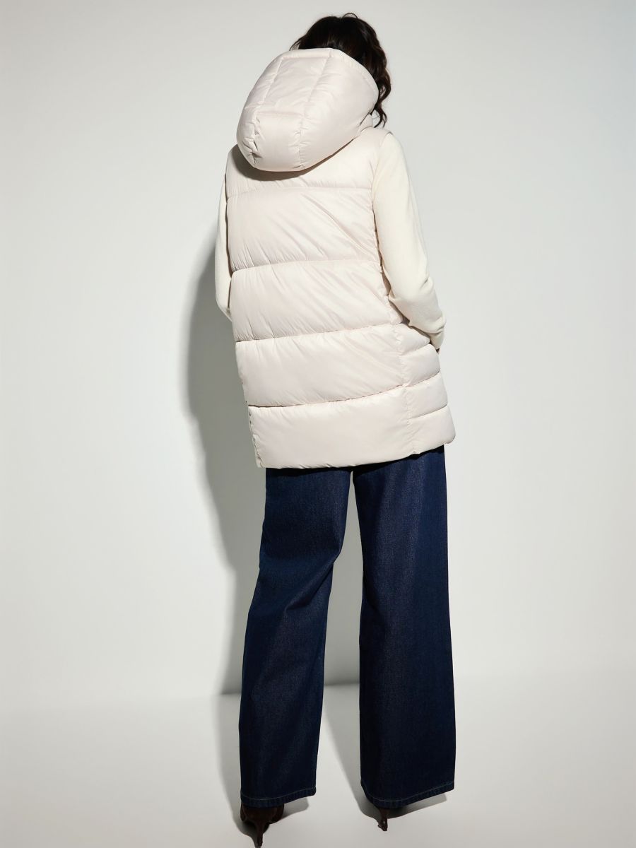 Pikowana kremowa kamizelka