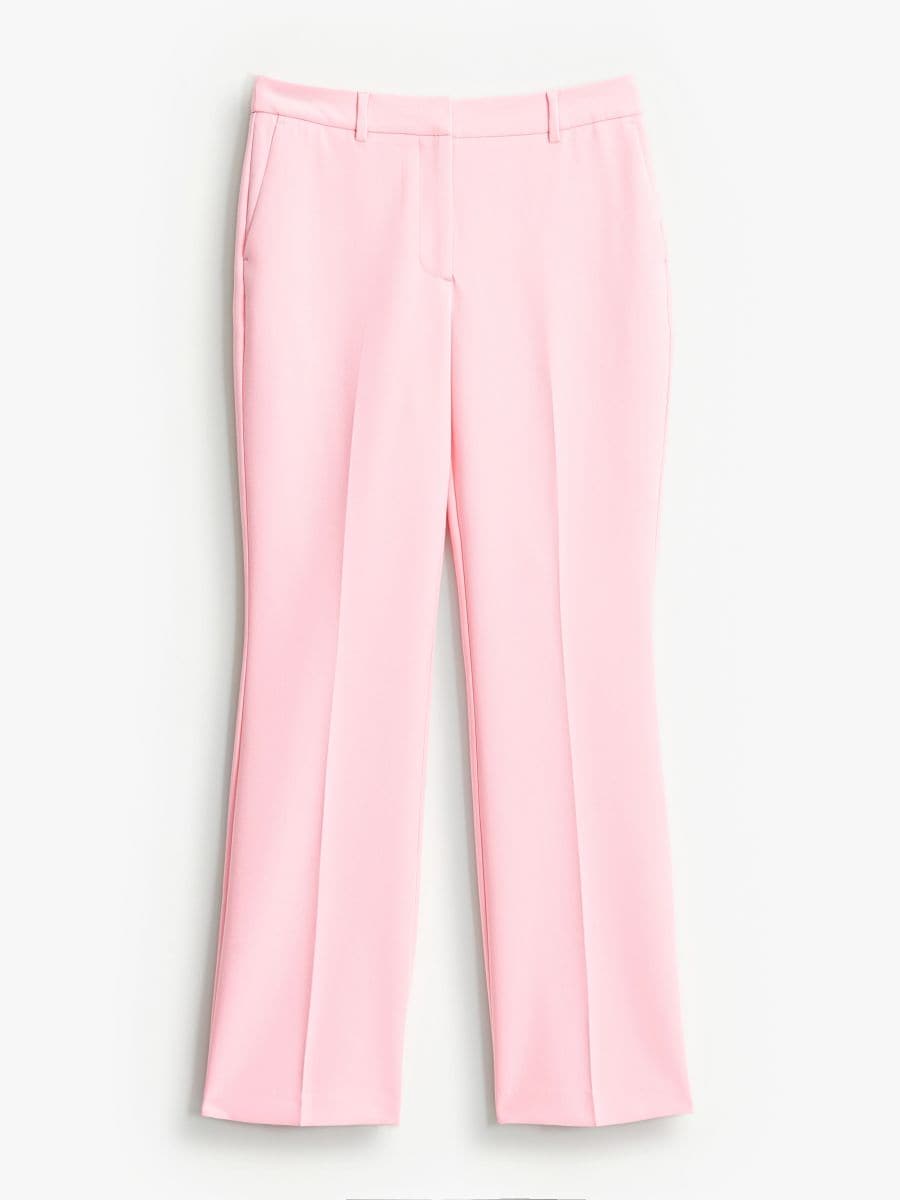 Jasnoróżowe spodnie flare