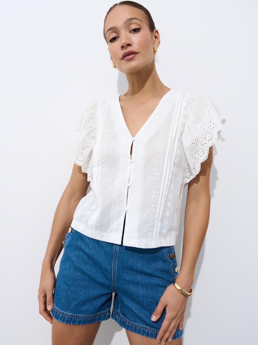 Biała bluzka z falbanami