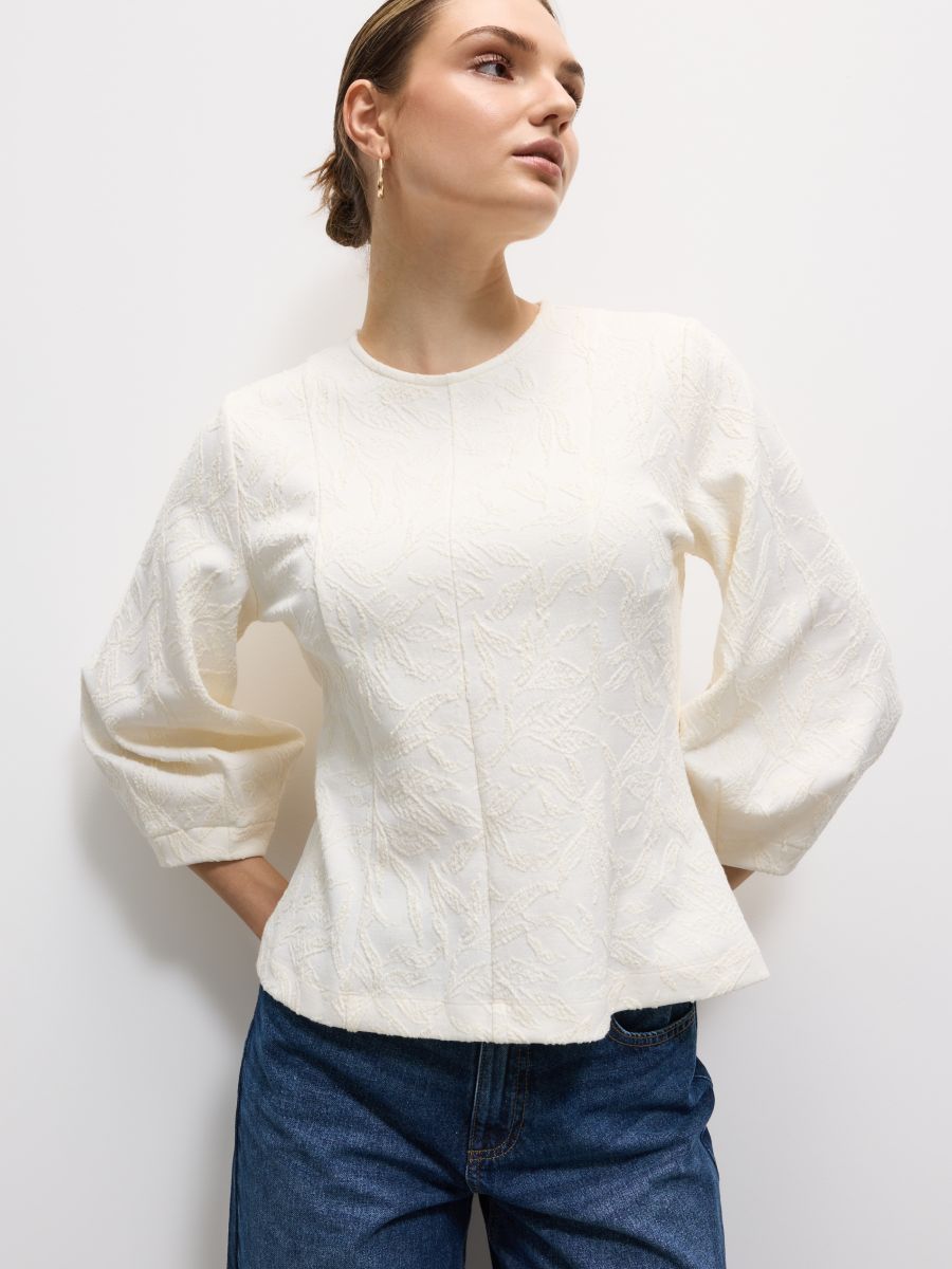 Turkusowa bluzka z bufiastym rękawem