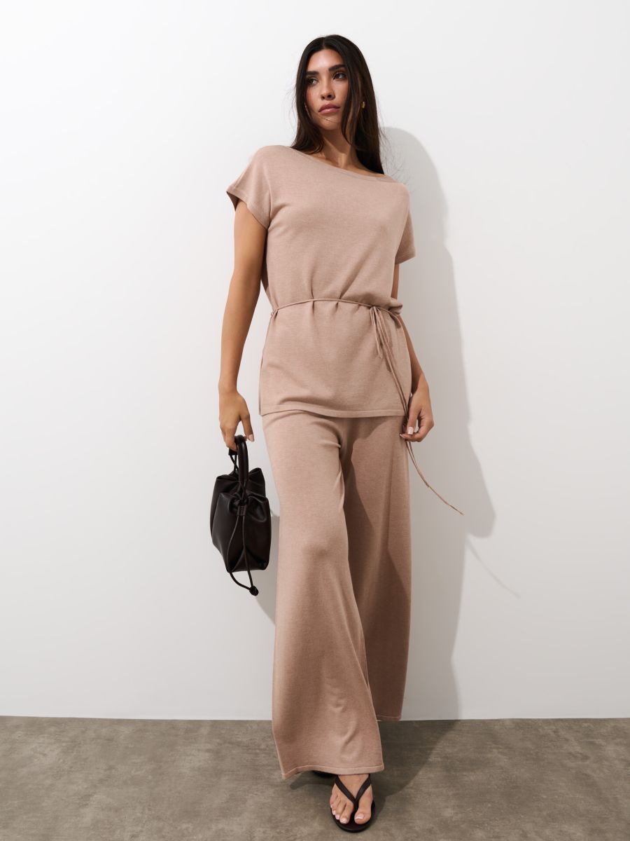 Dzianinowe kremowe spodnie