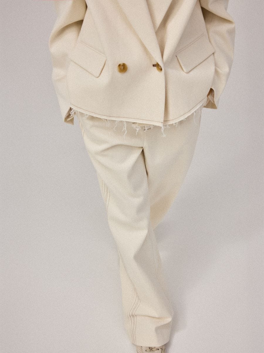 Kremowe spodnie wide leg