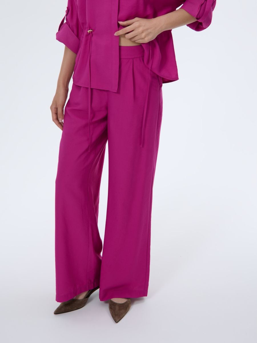 Szerokie różowe spodnie