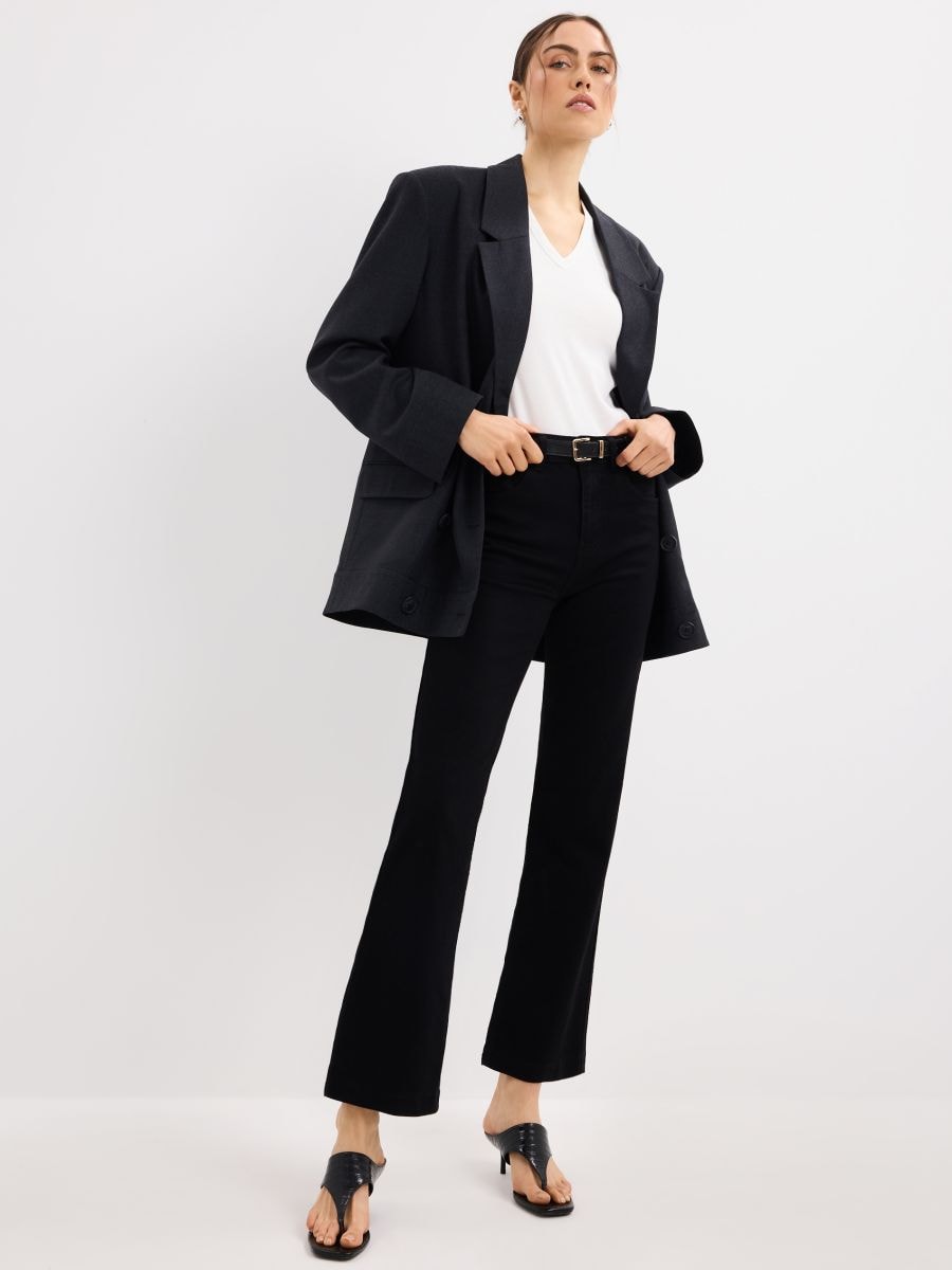 Jeansy bootcut z paskiem