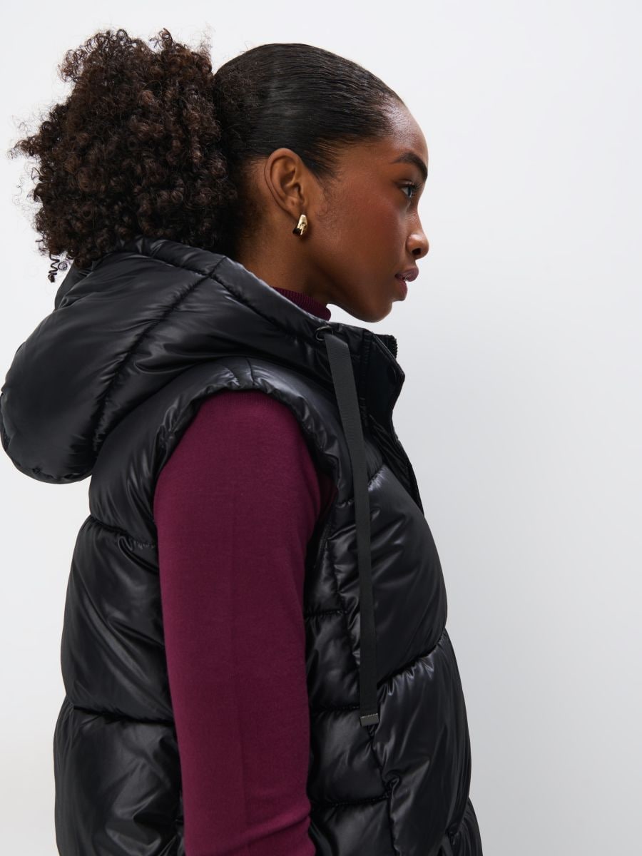 Pikowana kremowa kamizelka