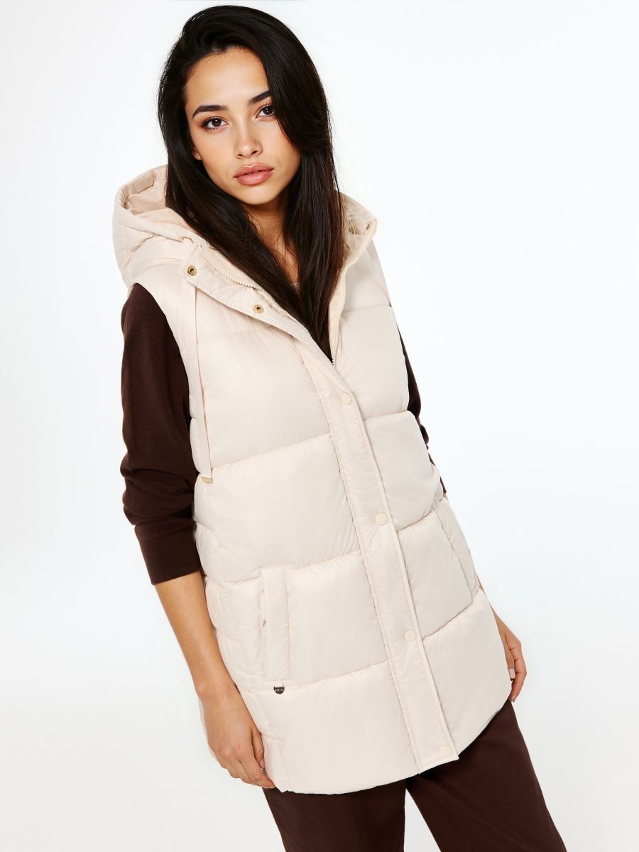 Pikowana kremowa kamizelka