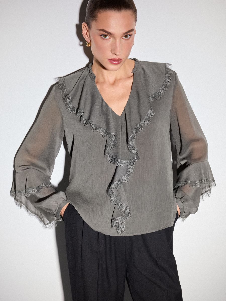 Różowa bluzka z falbanami