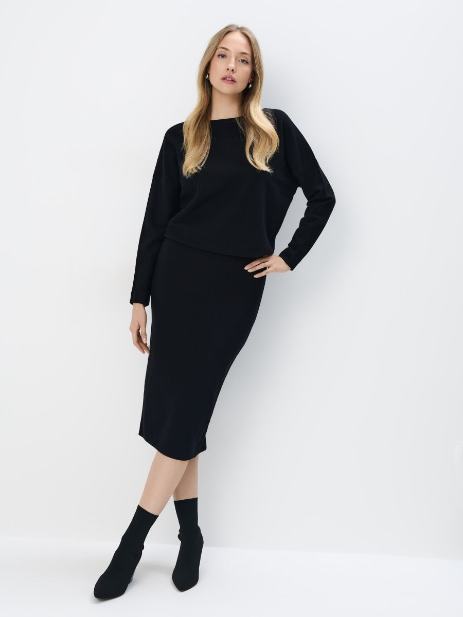 Dzianinowa zielona spódnica midi