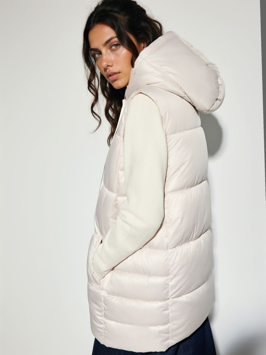 Pikowana kremowa kamizelka