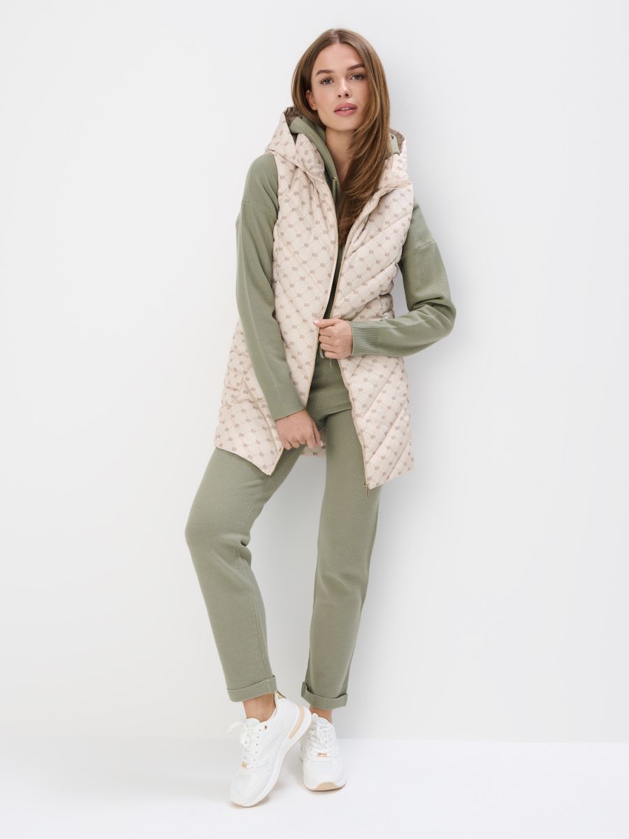 Pikowana kremowa kamizelka z kapturem