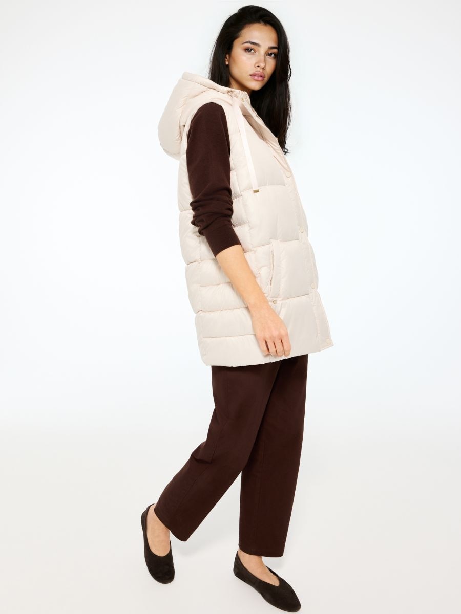 Pikowana kremowa kamizelka