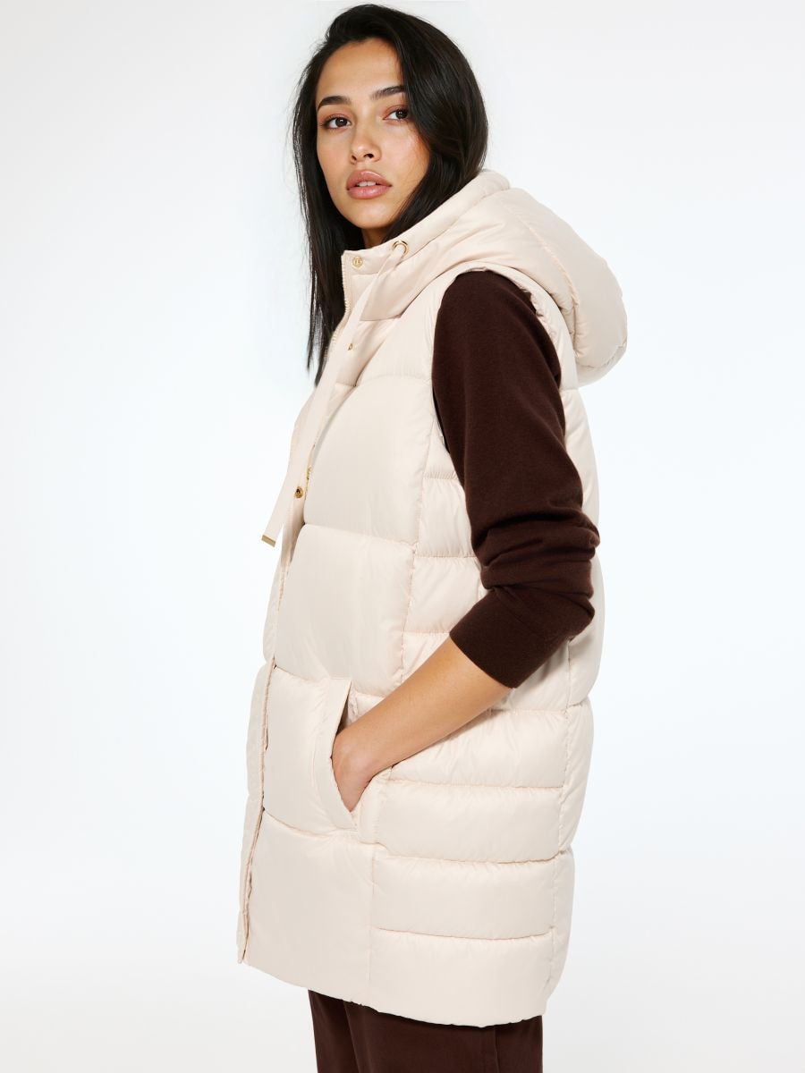 Pikowana kremowa kamizelka