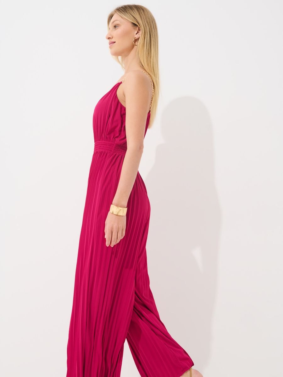 Różowy kombinezon na ramiączkach