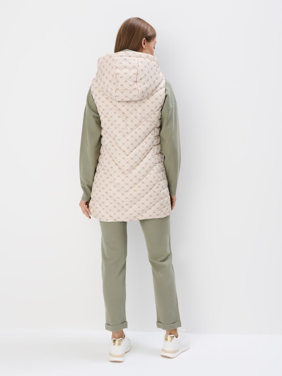 Pikowana kremowa kamizelka z kapturem