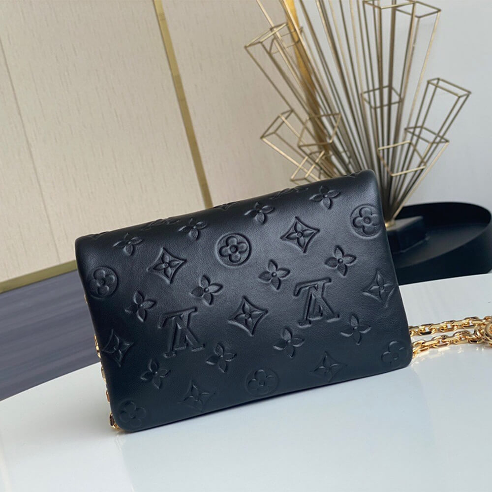 Louis Vuitton POCHETTE COUSSIN