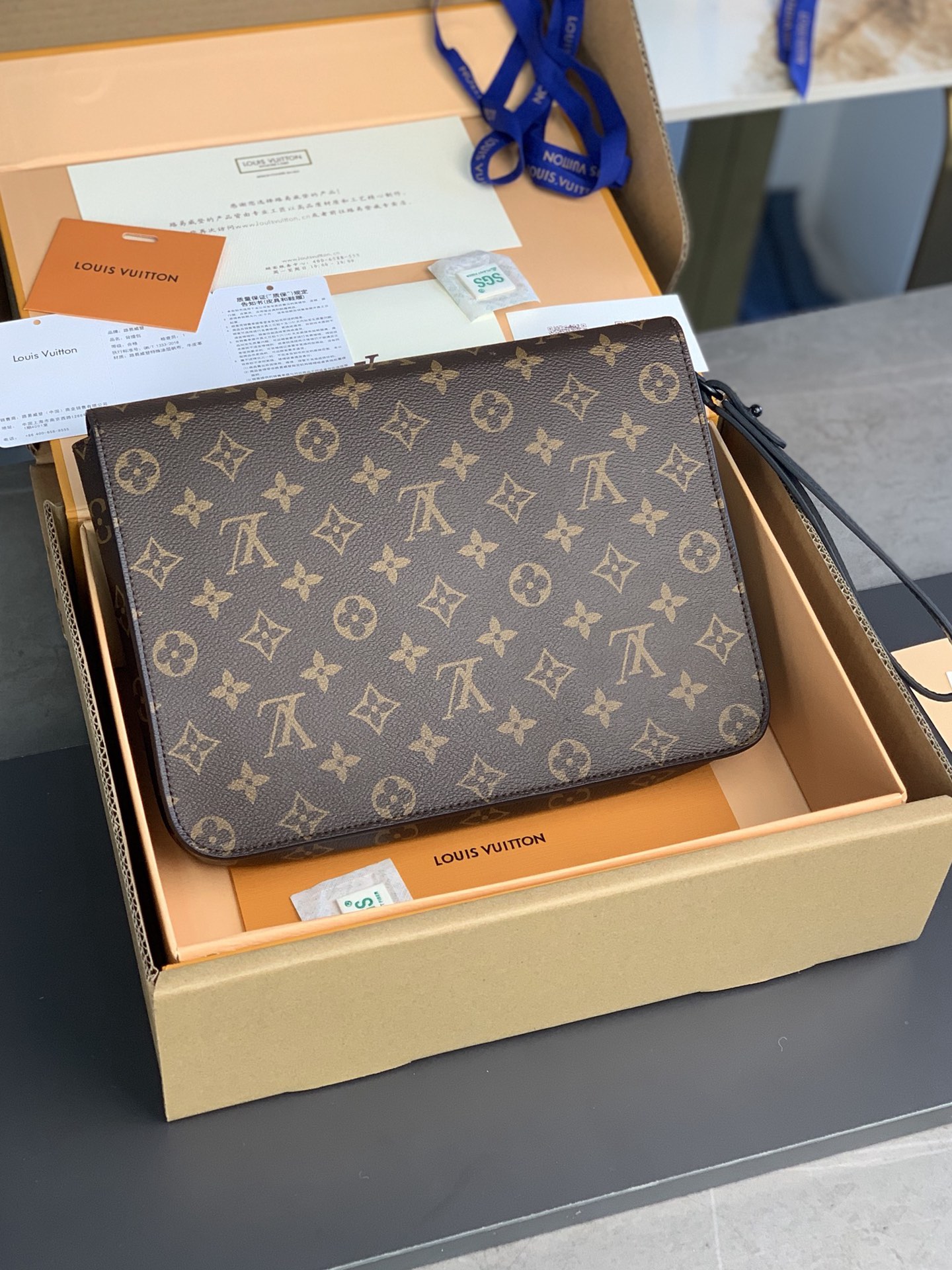 Louis Vuitton S Lock A4 Pouch Monogram Macassar Coated Canvas M80560