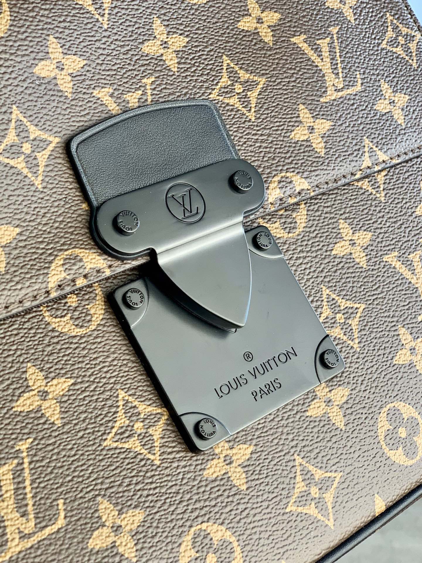Louis Vuitton S Lock A4 Pouch Monogram Macassar Coated Canvas M80560