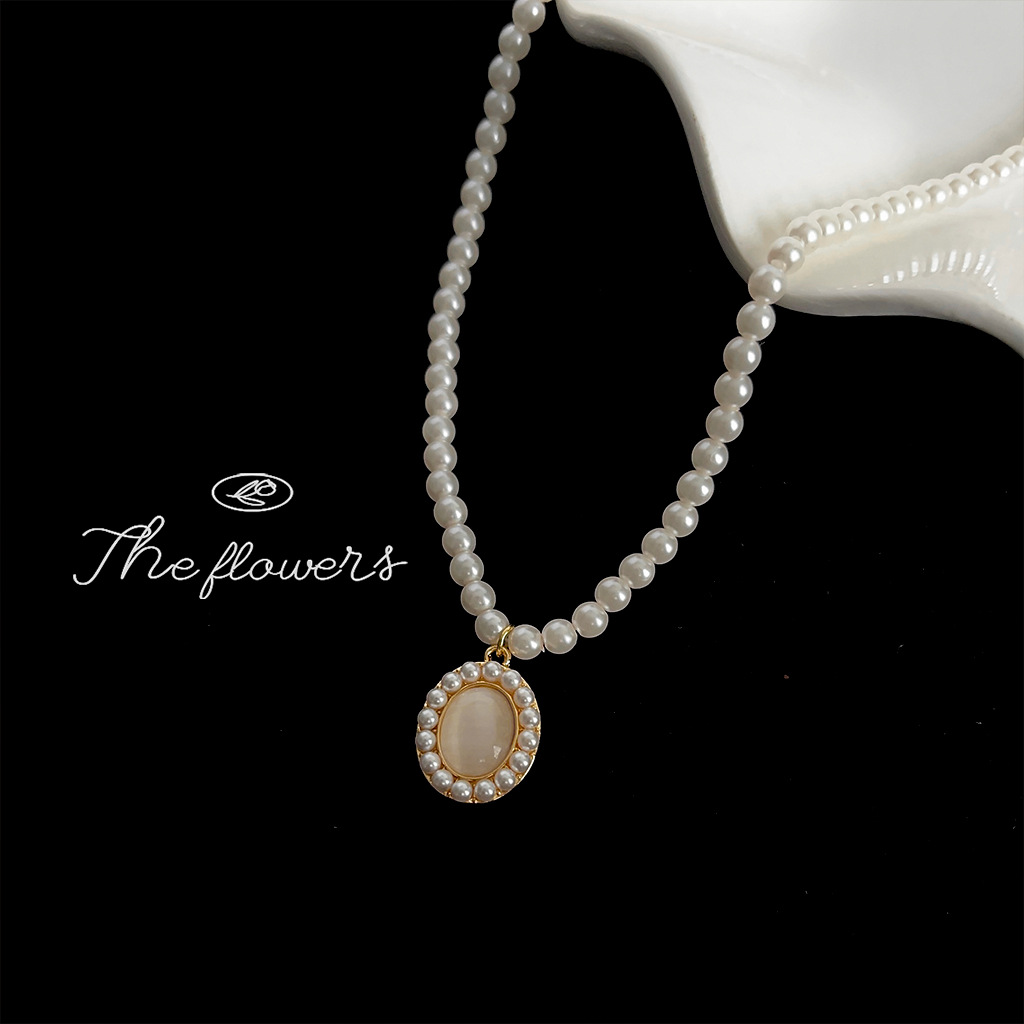 Light luxury glass cat's eye stone, gentle temperament pearl necklace, high-end retro lady's small fragrance style clavicle chain