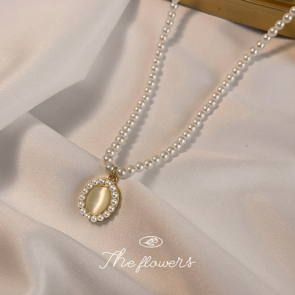 Light luxury glass cat's eye stone, gentle temperament pearl necklace, high-end retro lady's small fragrance style clavicle chain