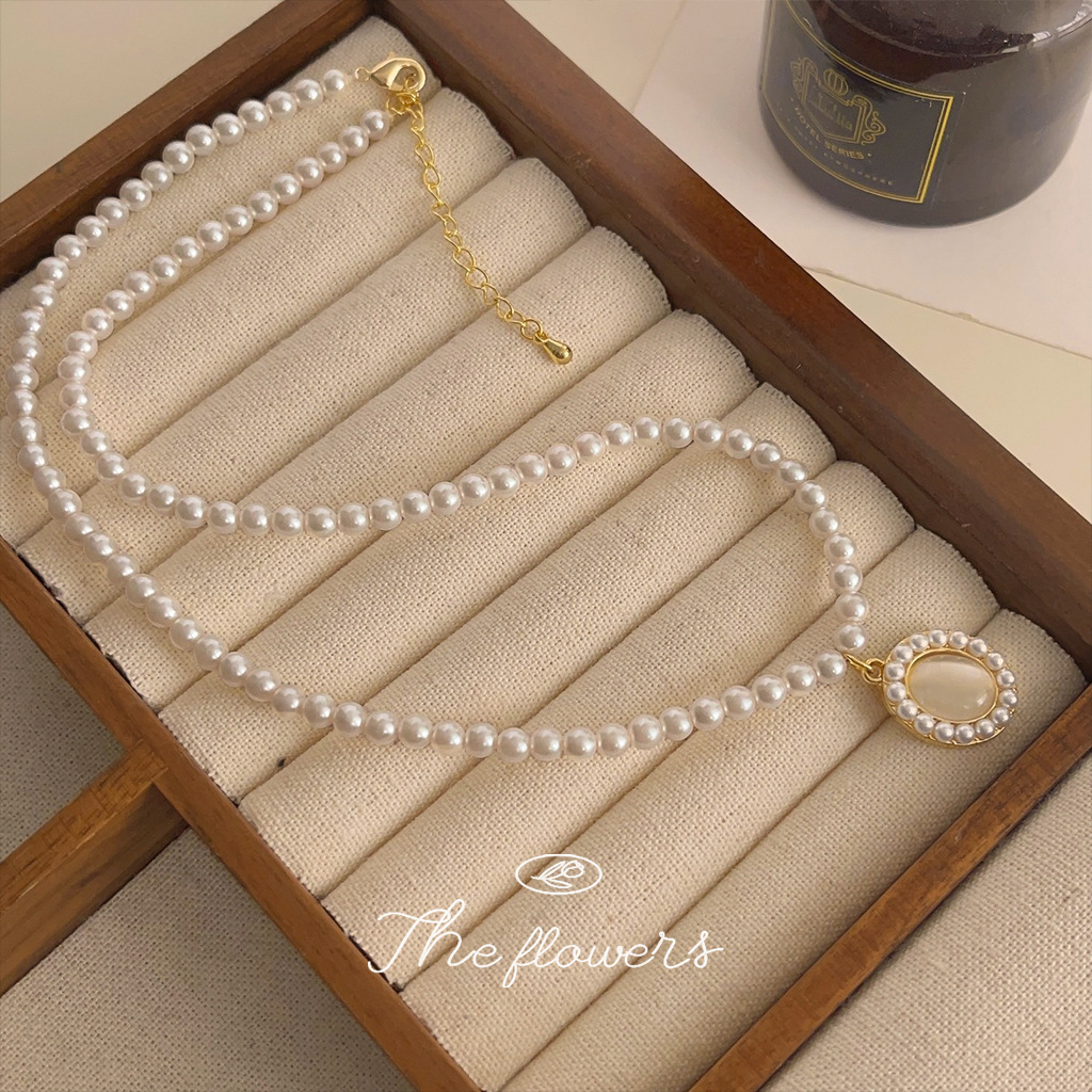 Light luxury glass cat's eye stone, gentle temperament pearl necklace, high-end retro lady's small fragrance style clavicle chain