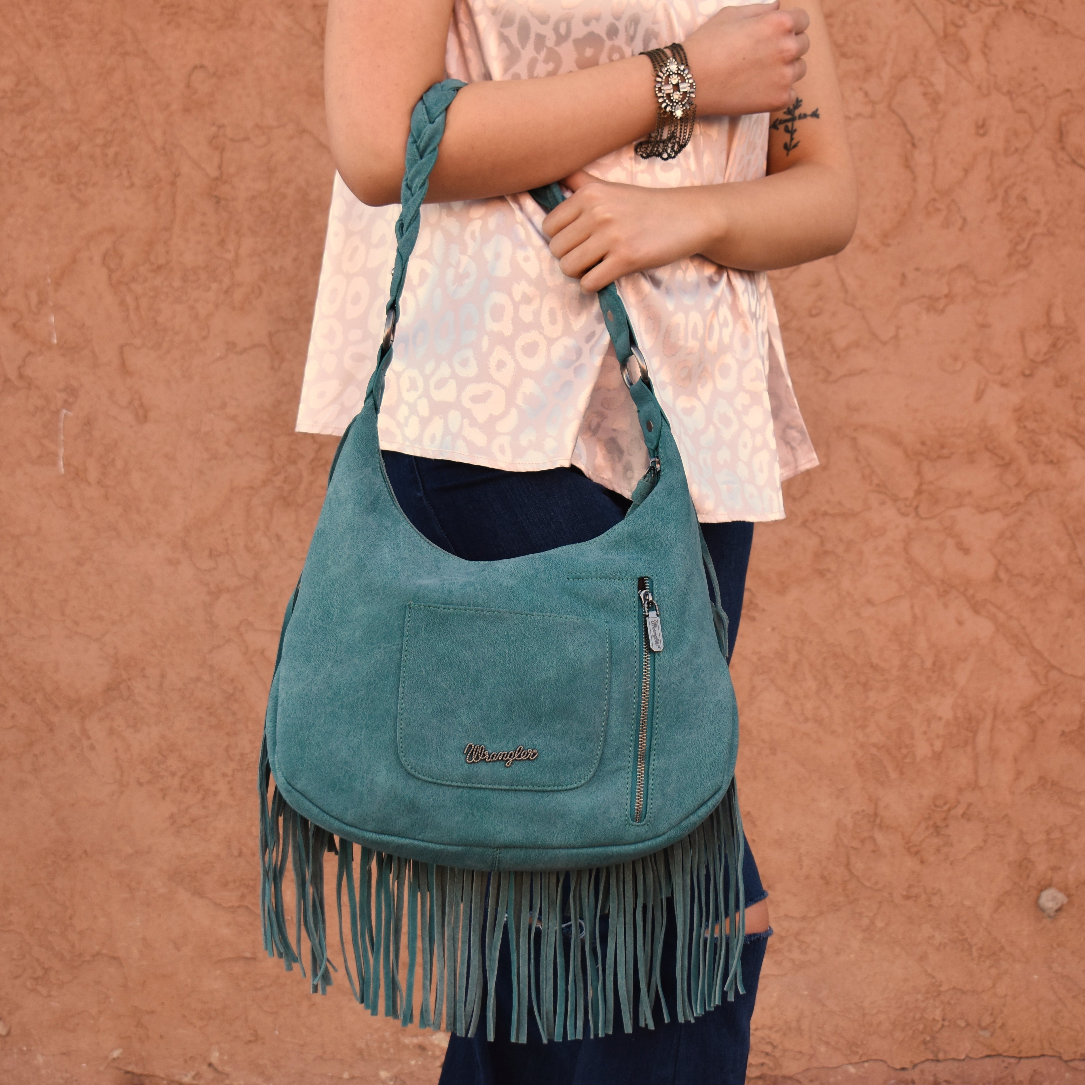 Turquoise Fringe Suede Bag by WRANGLER