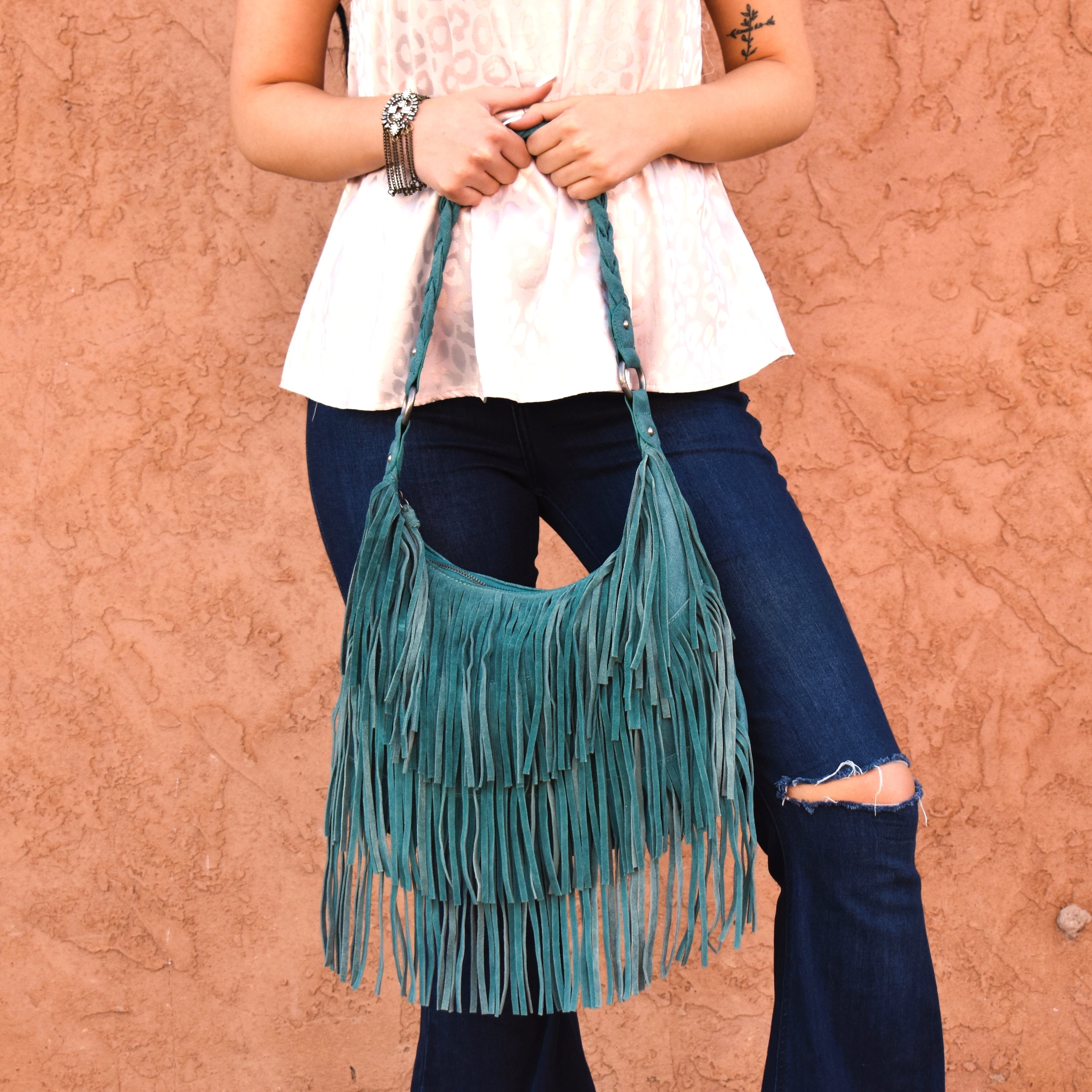 Turquoise Fringe Suede Bag by WRANGLER