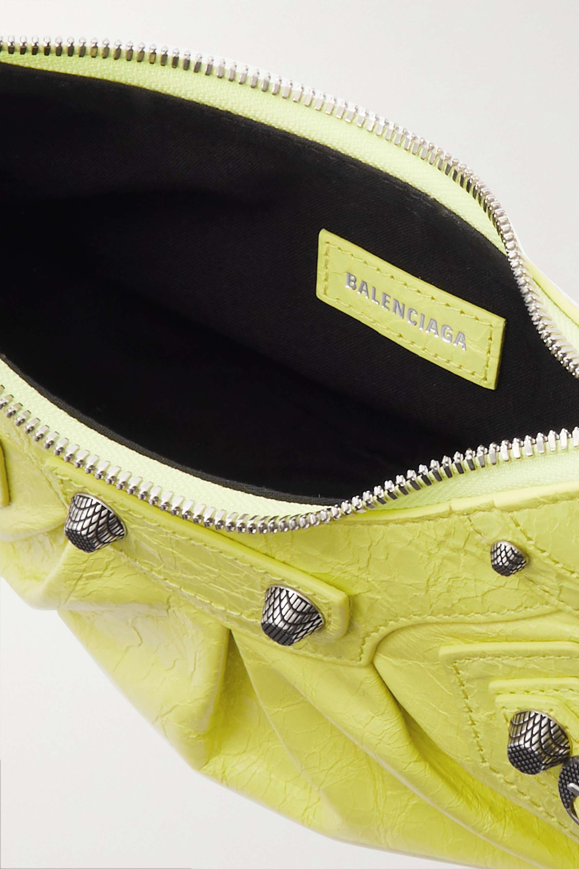 BALENCIAGA Le Cagole XS studded crinkled-leather shoulder bag yellow - Ultra-Collectible