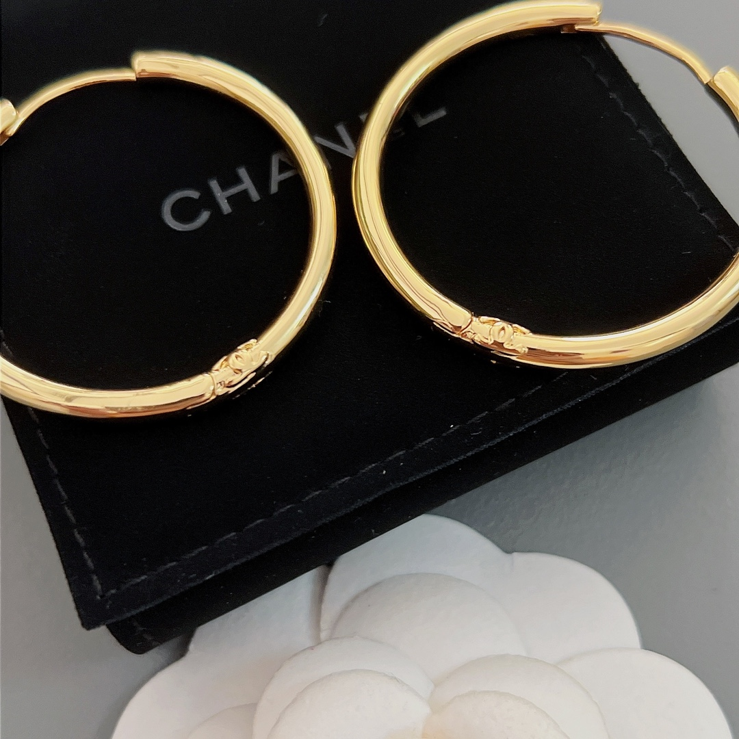 Chanel Round Earrings - Ultra-Collectible