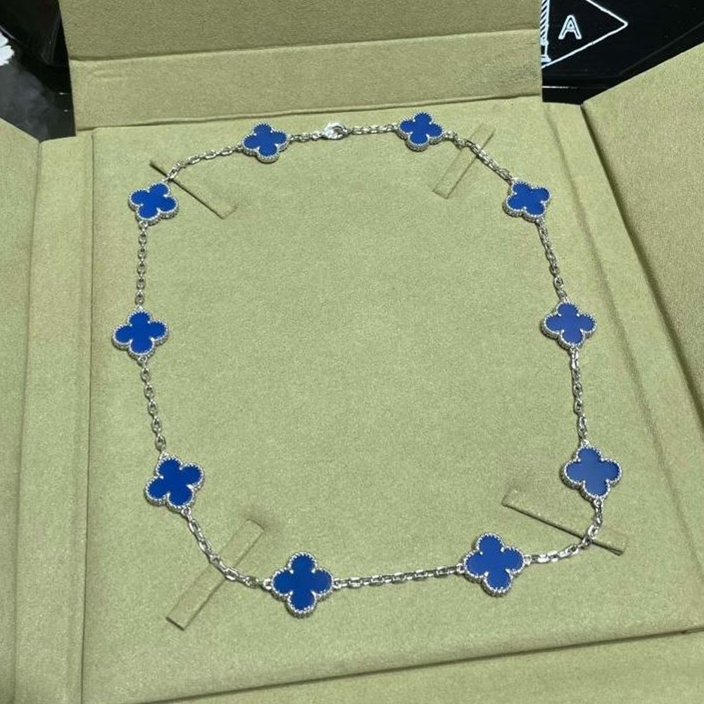 Van Cleef & Arpels Vca Cross Flower Necklace - Ultra-Collectible