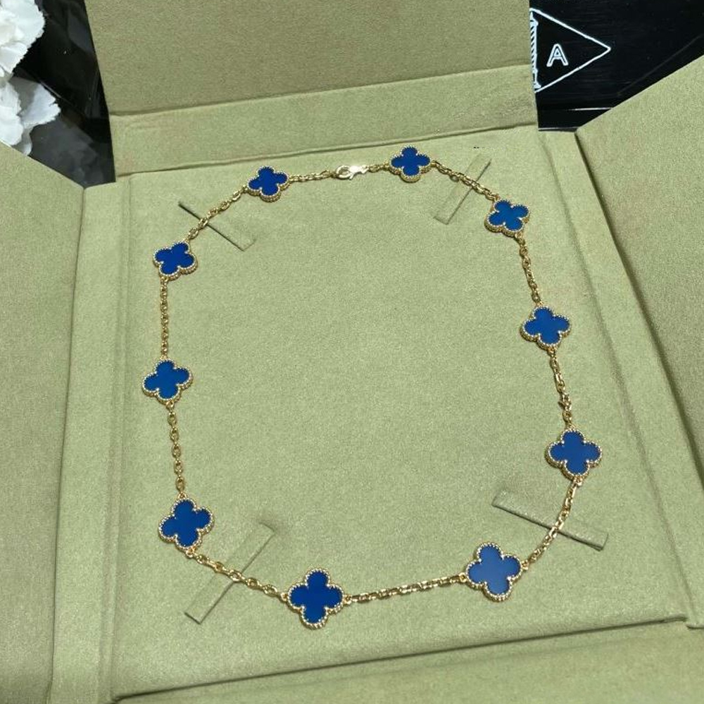 Van Cleef & Arpels Vca Cross Flower Necklace - Ultra-Collectible