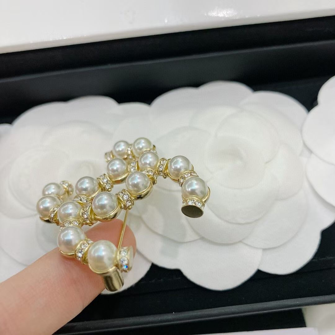 Chanel Double C Pearl Brooch - Ultra-Collectible