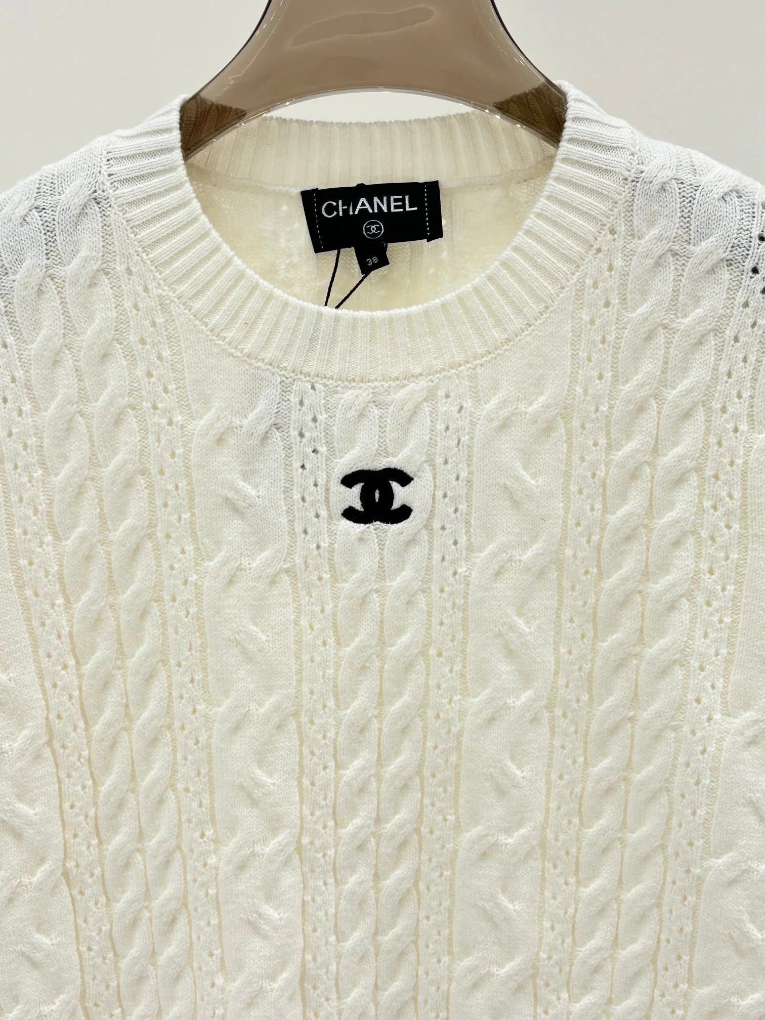 Round neck solid color twist logo knitted long sleeves - Ultra-Collectible