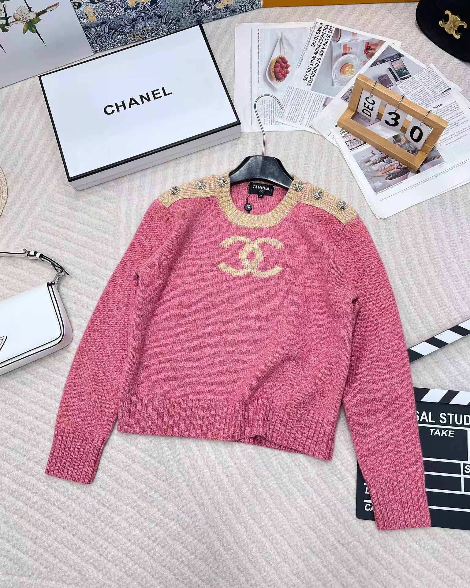 Pink jacquard knit long sleeves with dropped shoulders and button detail - Ultra-Collectible