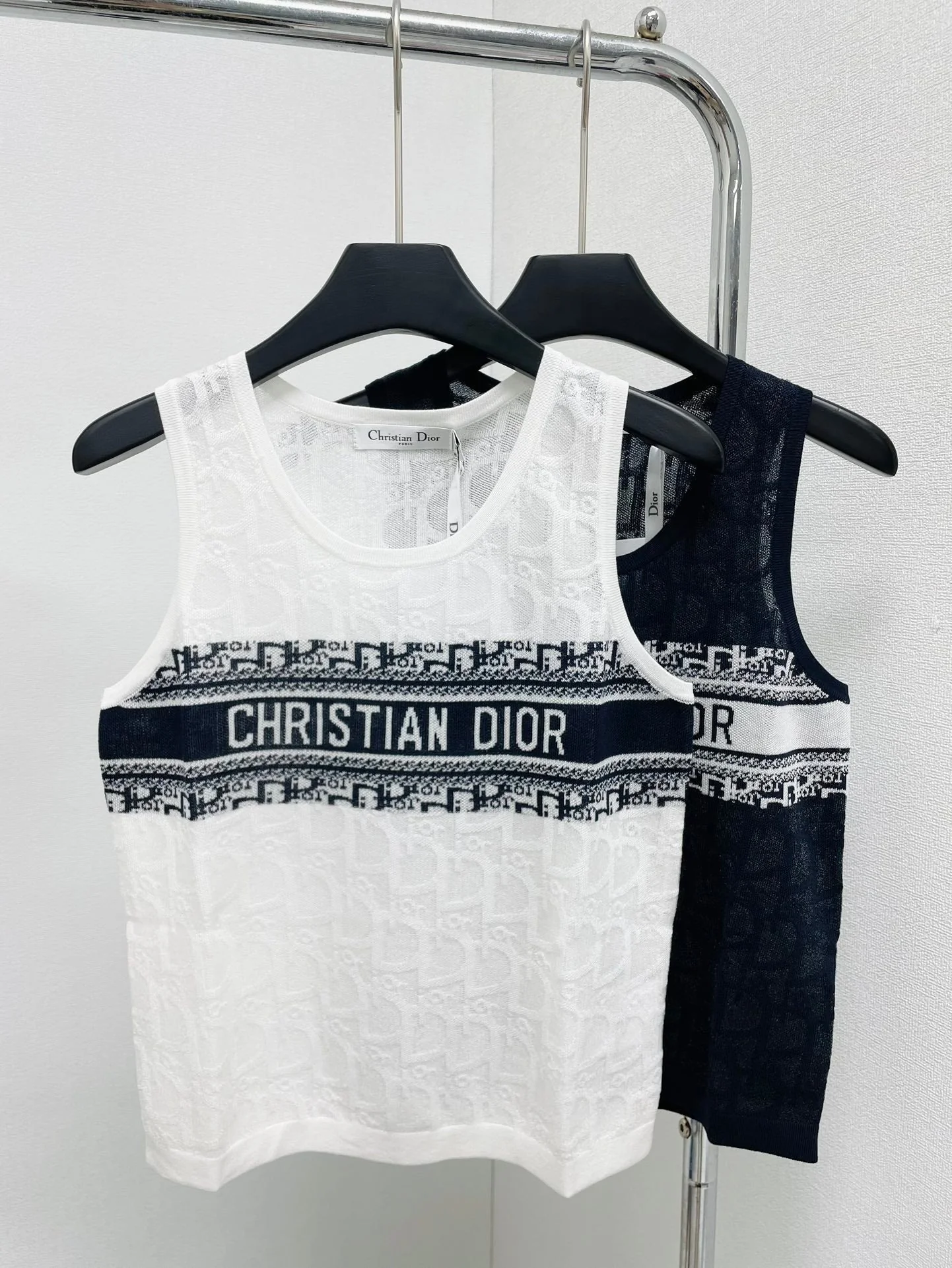 Vest with dark logo on chest - Ultra-Collectible