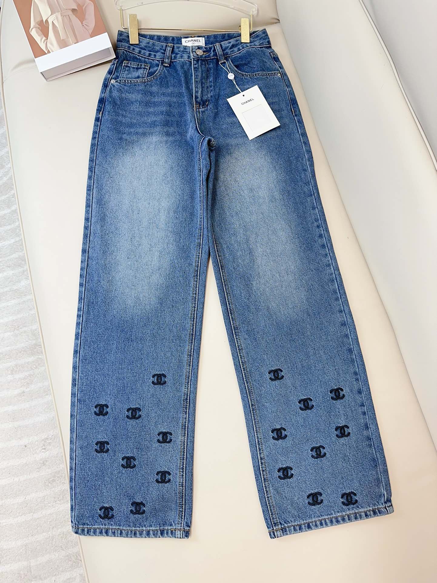 Wide-leg jeans with dense embroidered logo on the hem - Ultra-Collectible