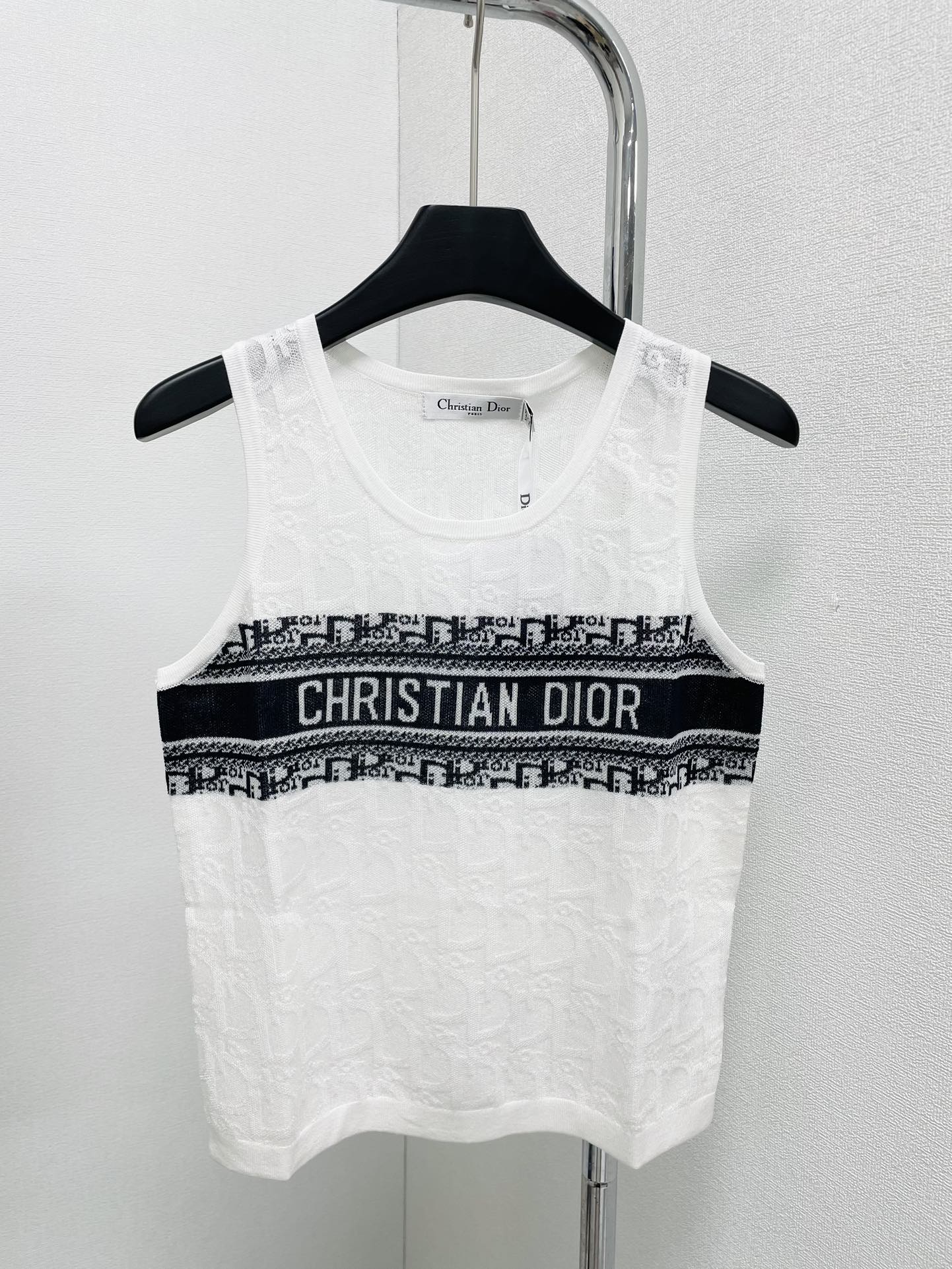 Vest with dark logo on chest - Ultra-Collectible