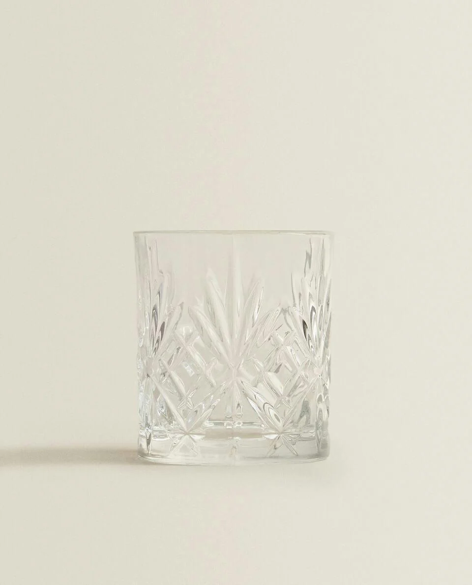 CRYSTALLINE TUMBLER WITH RAISED DESIGN