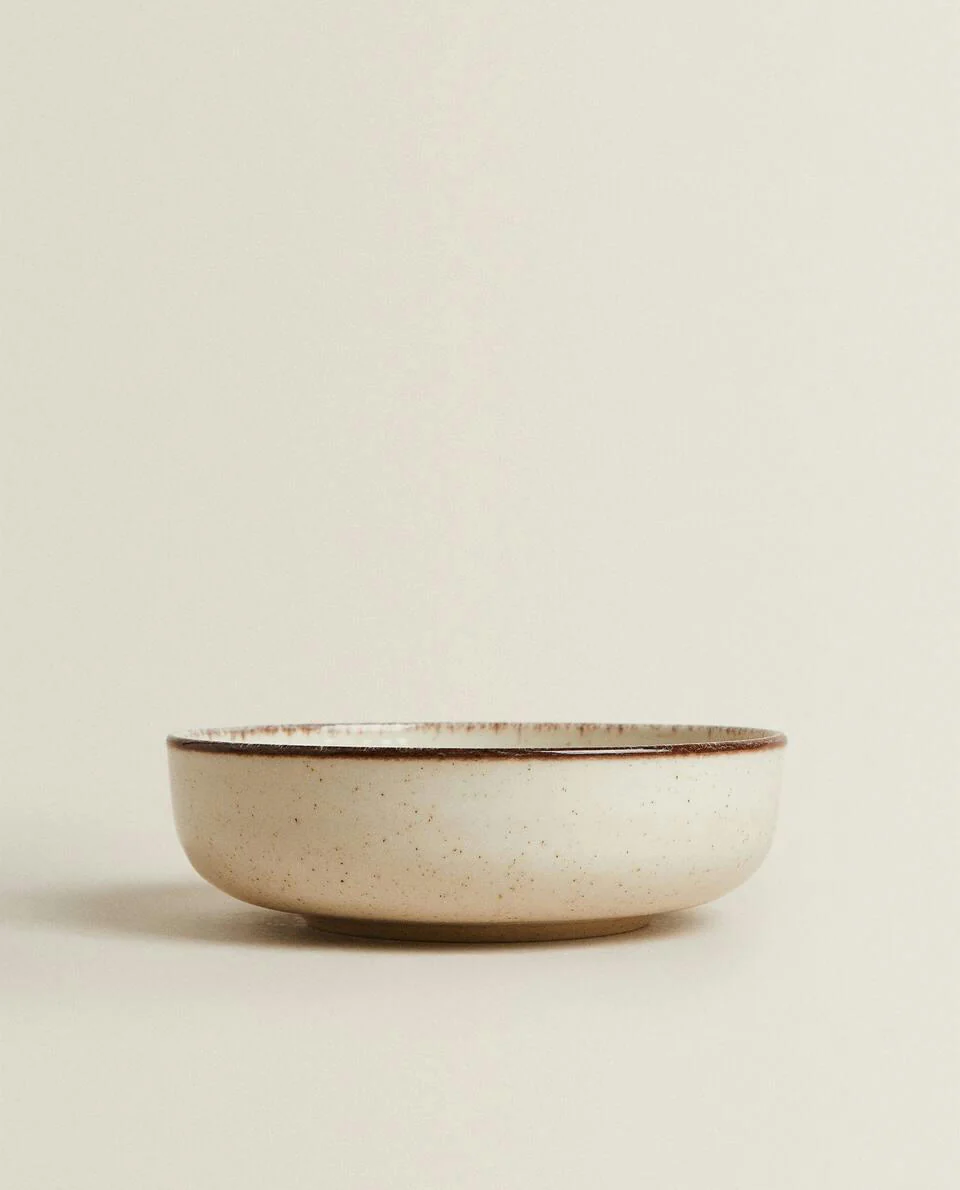 PORCELAIN BOWL WITH ANTIQUE FINISH RIM