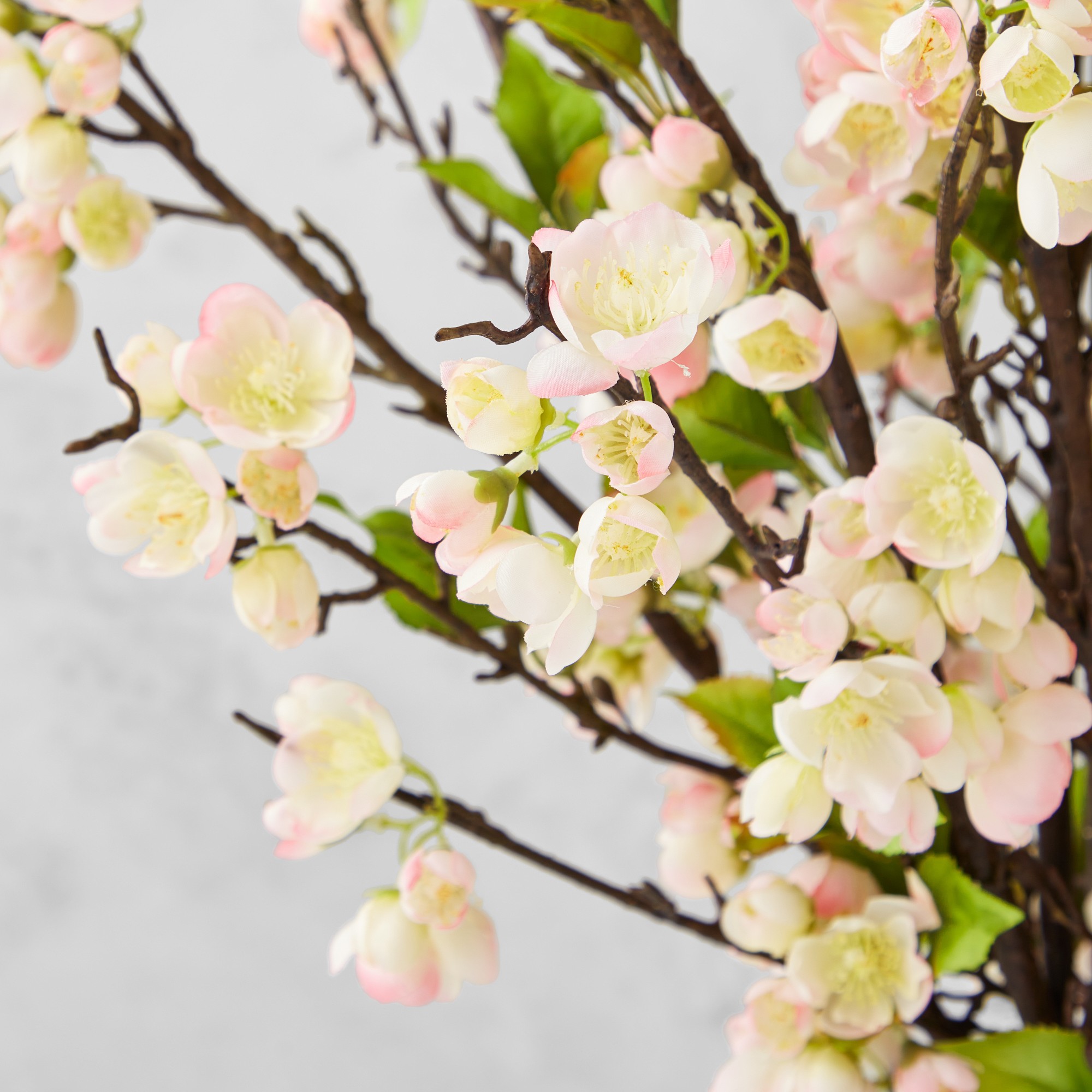 Faux Plum Blossom Arrangement in Glass Vase