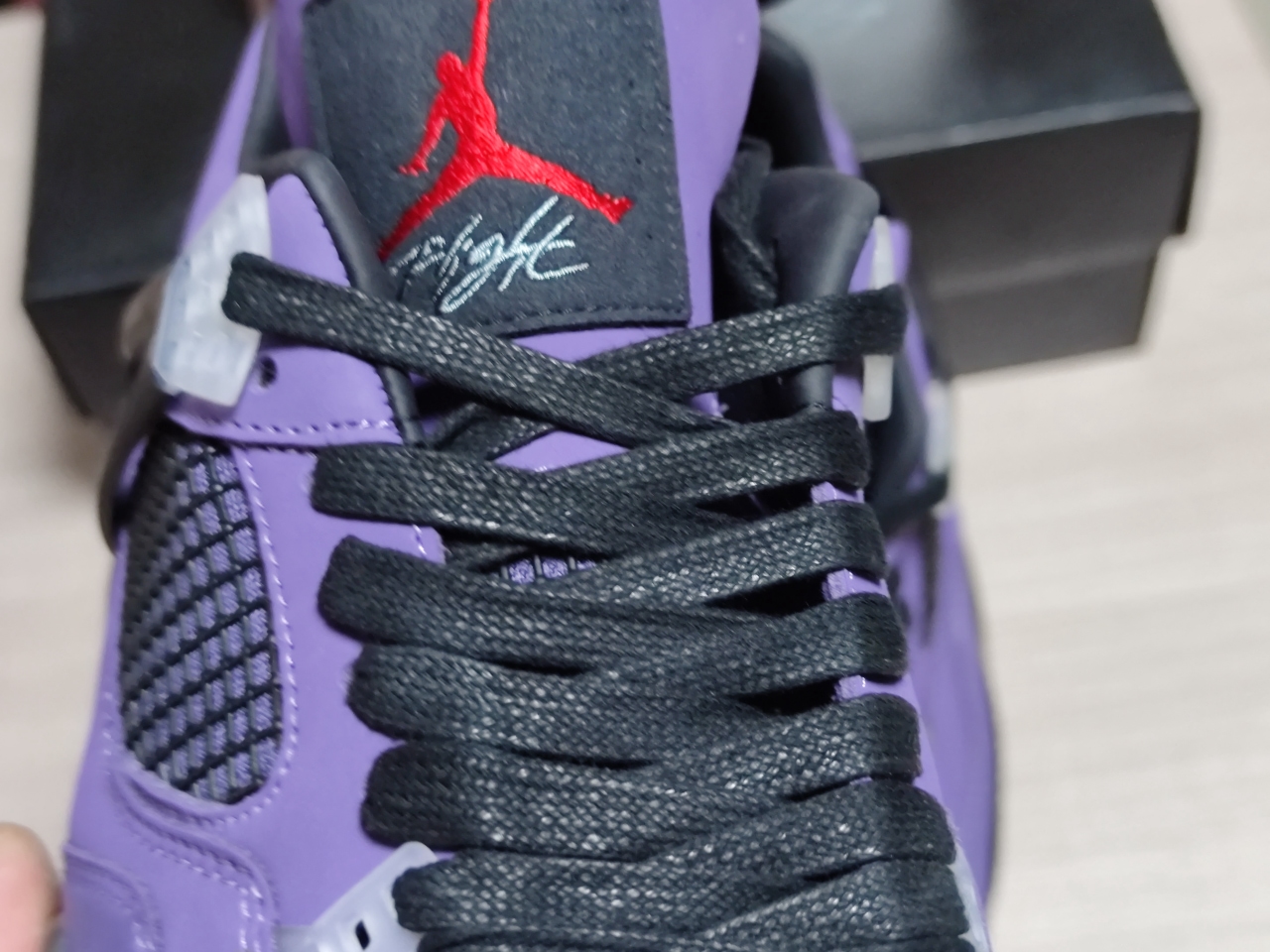 Jordan 4 Retro Purple and black