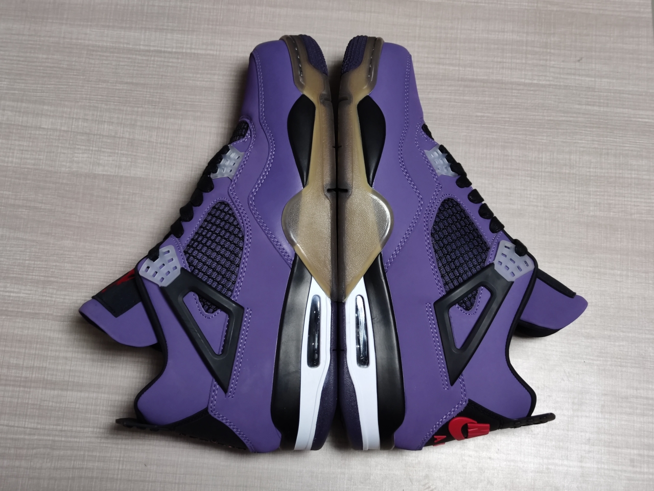Jordan 4 Retro Purple and black