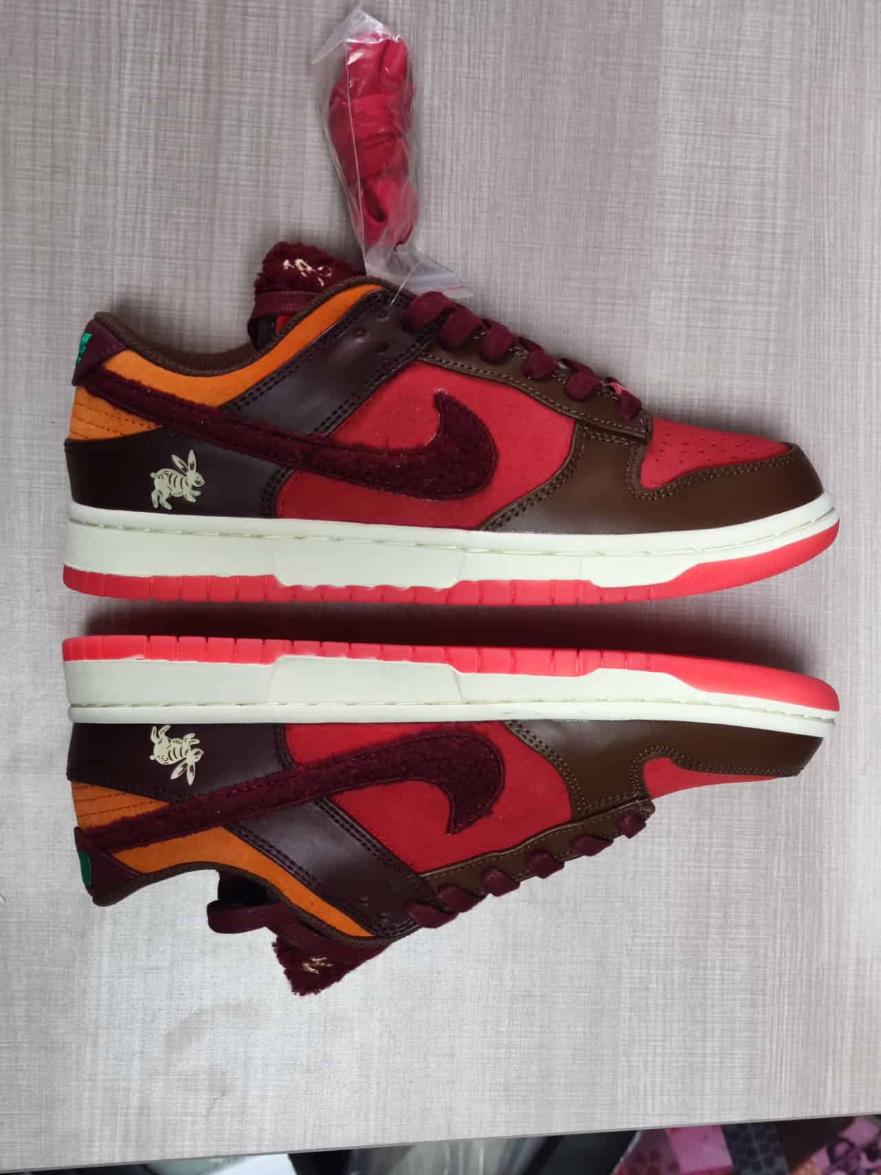 Dunk Low Retro PRM Year of the Rabbit Light Crimson FD4203 661
