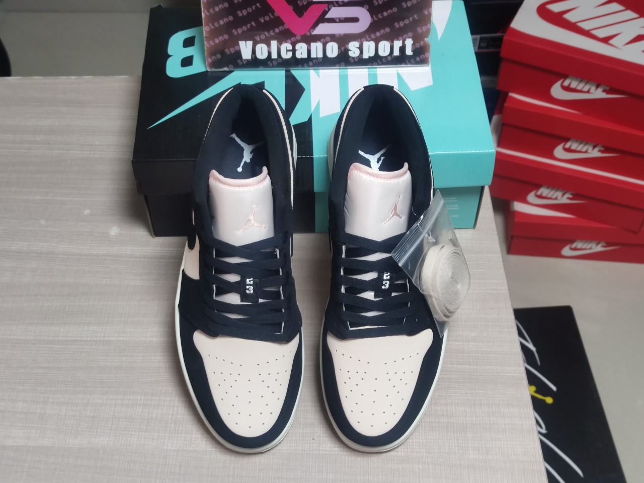 Jordan 1 Low Black Guava Ice DC0774-003