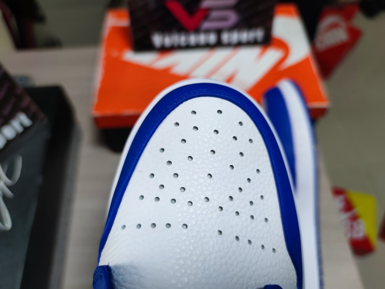 Jordan 1 Low Hyper Royal Orange Peel 553558-401