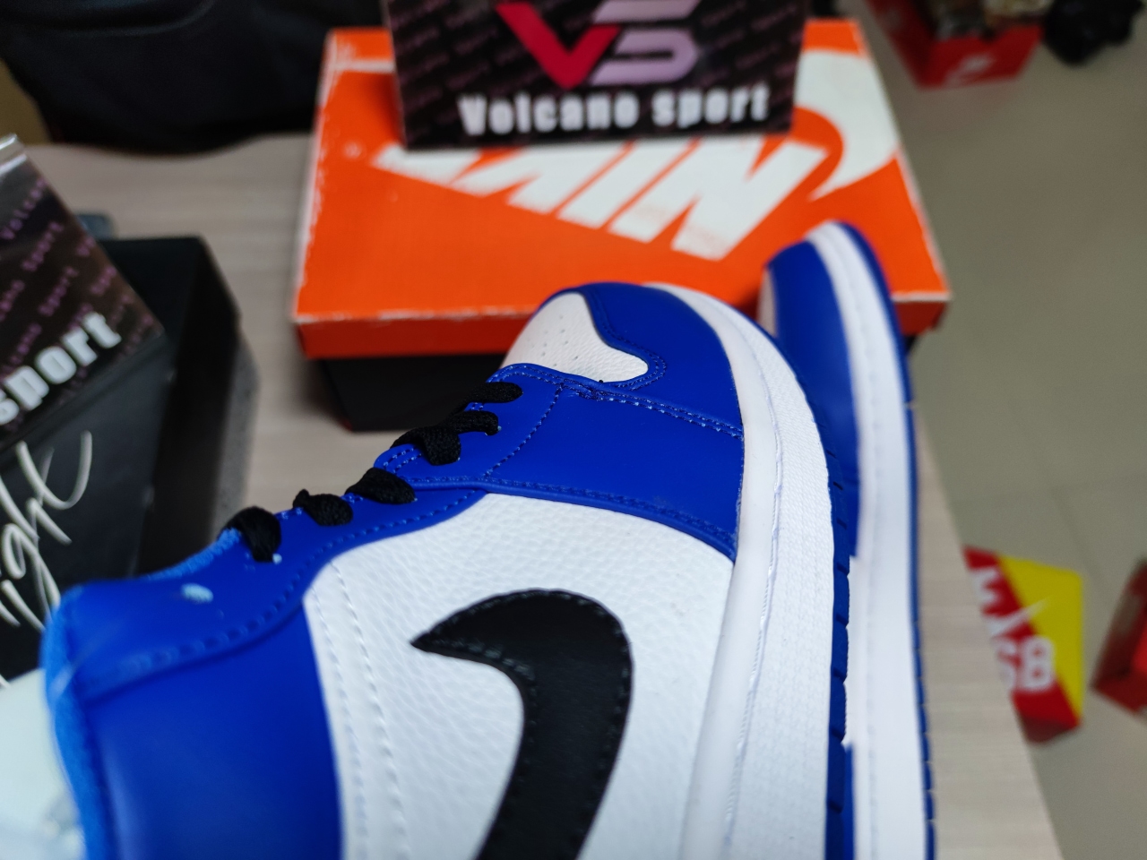 Jordan 1 Low Hyper Royal Orange Peel 553558-401
