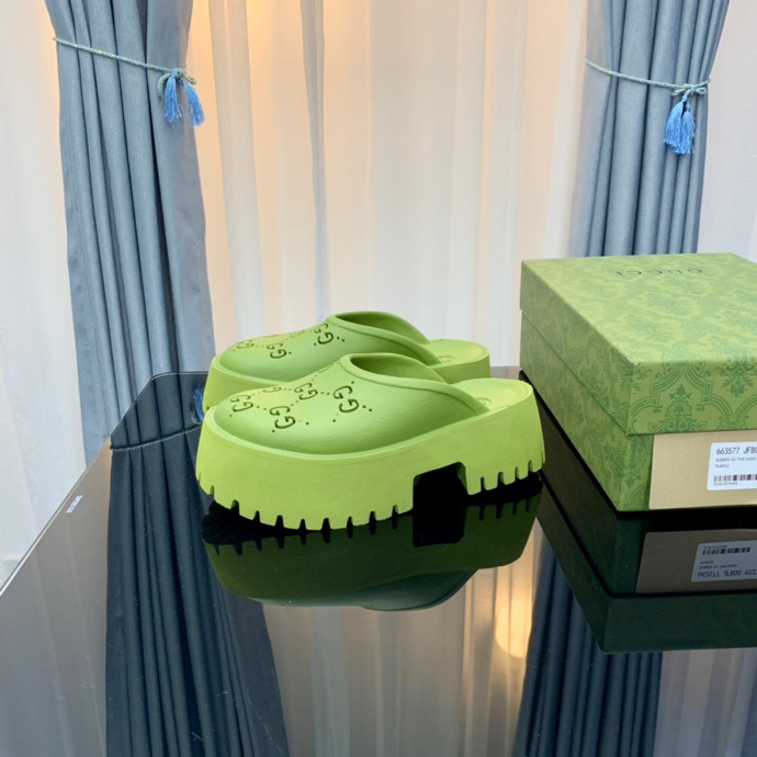 Gucci perforated GG platform mules Green