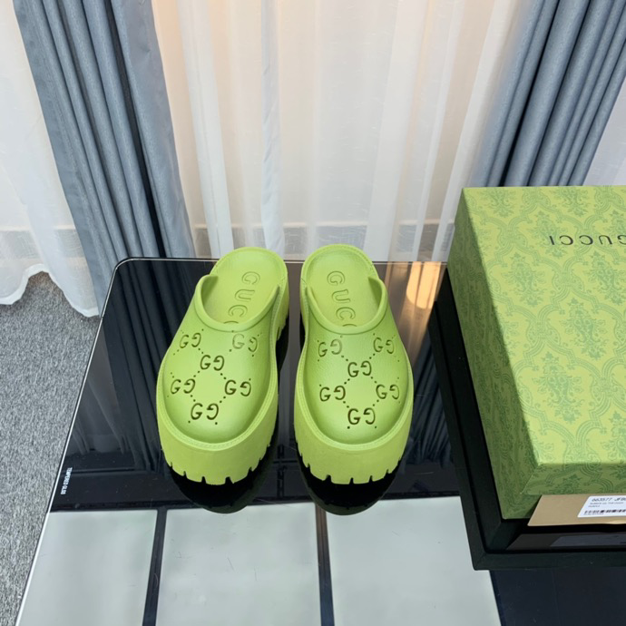 Gucci perforated GG platform mules Green