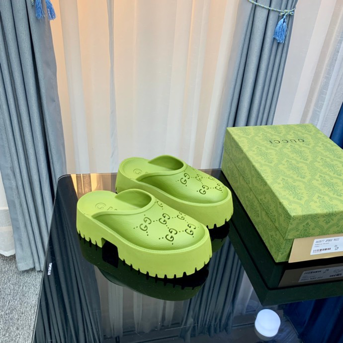 Gucci perforated GG platform mules Green