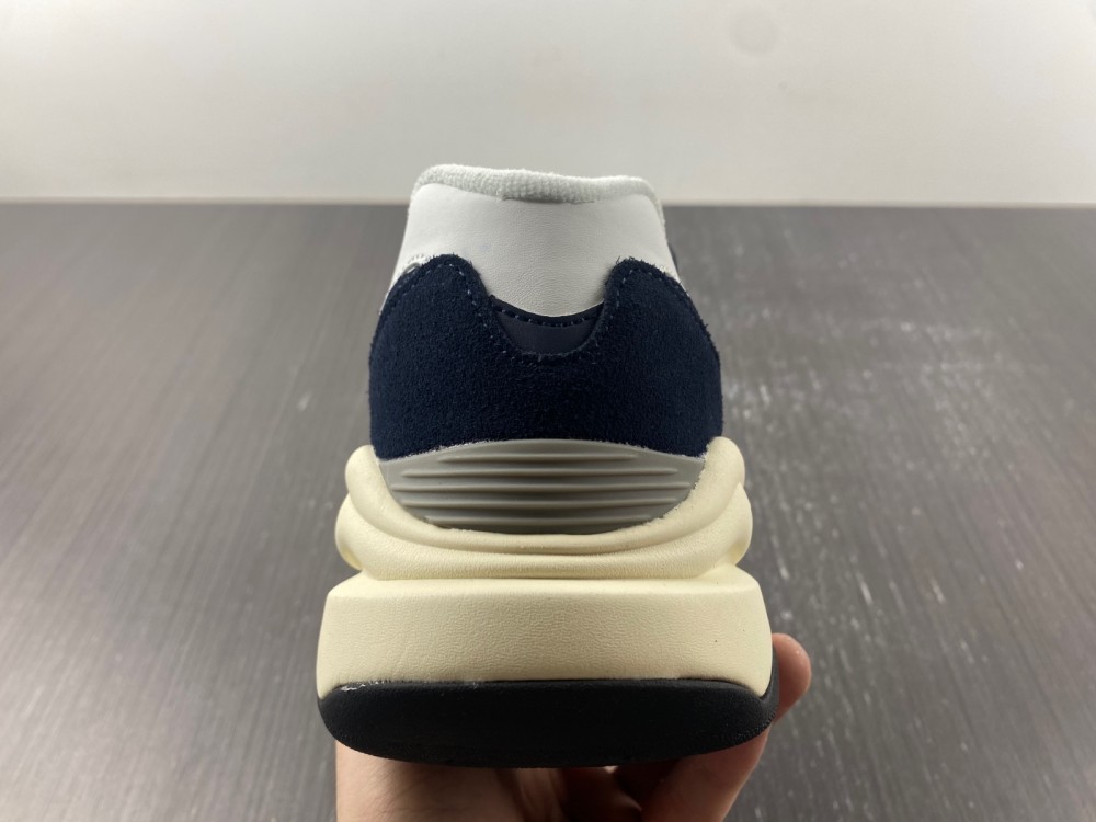 New Balance navy and white trainer